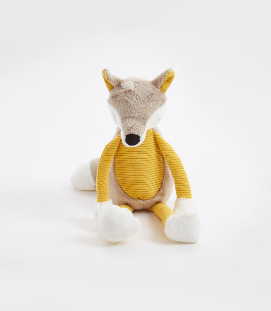 Plush mustard yellow and brown fox soft toy with pointed ears, seated against white background