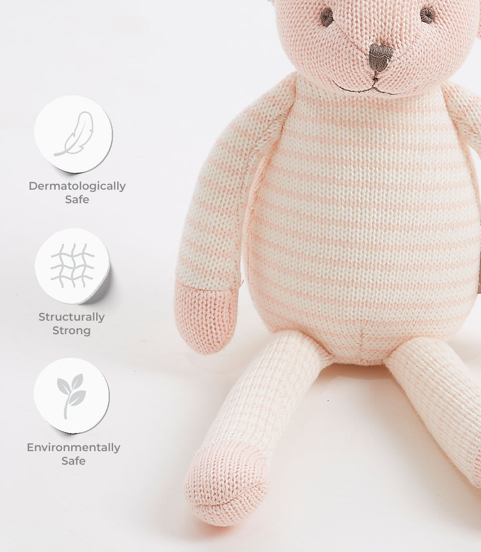 Soft pink and white striped knitted bunny toy with embroidered features, dermatologically safe and eco-friendly