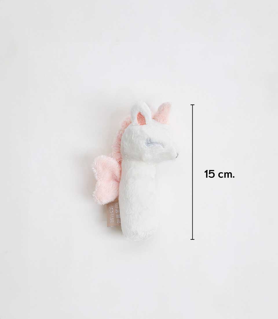 Pink baby girl gift basket with white plush unicorn rattle and embroidered details
