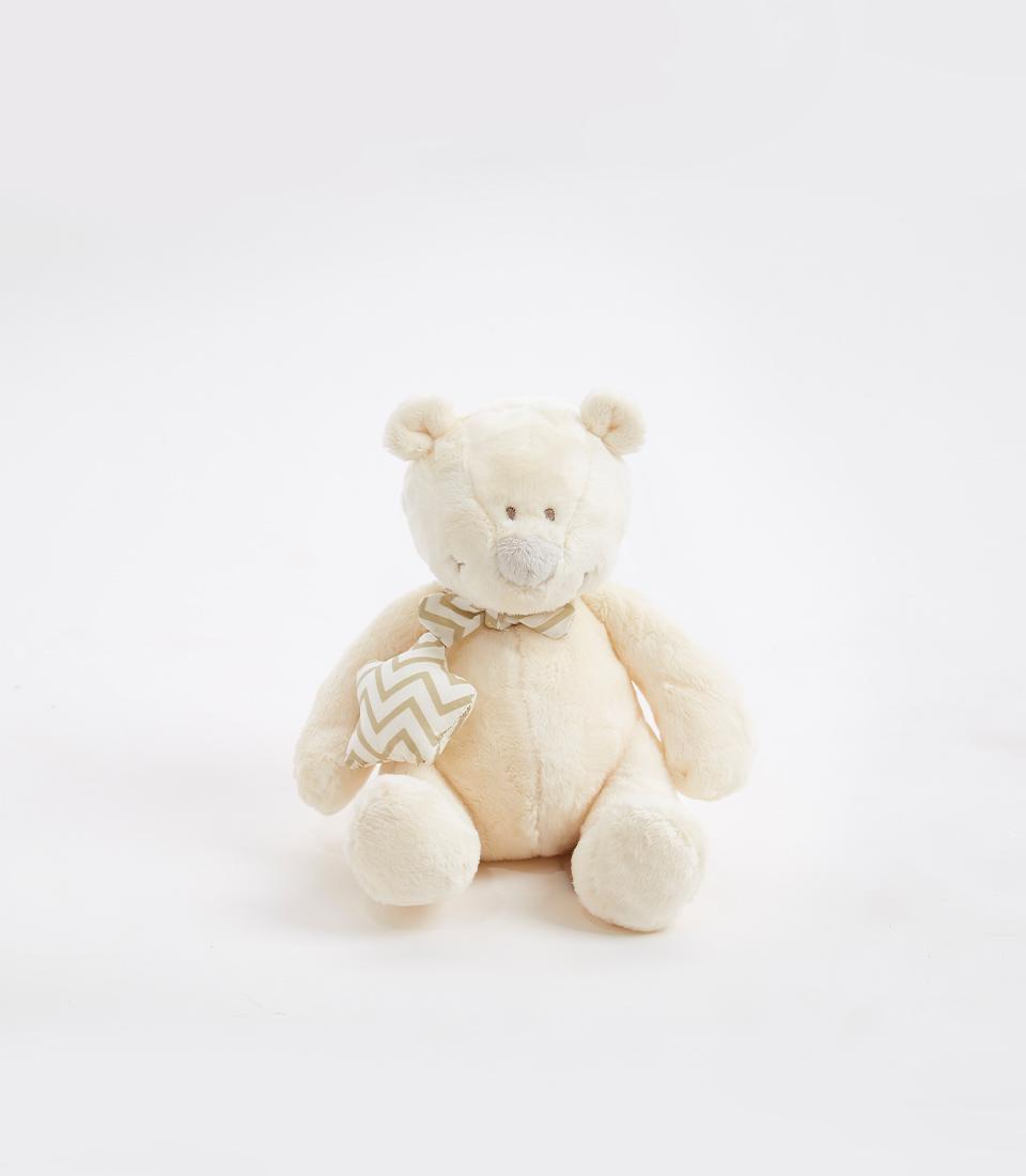Cream plush teddy bear with chevron-patterned bow tie and star toy, perfect for baby gifts