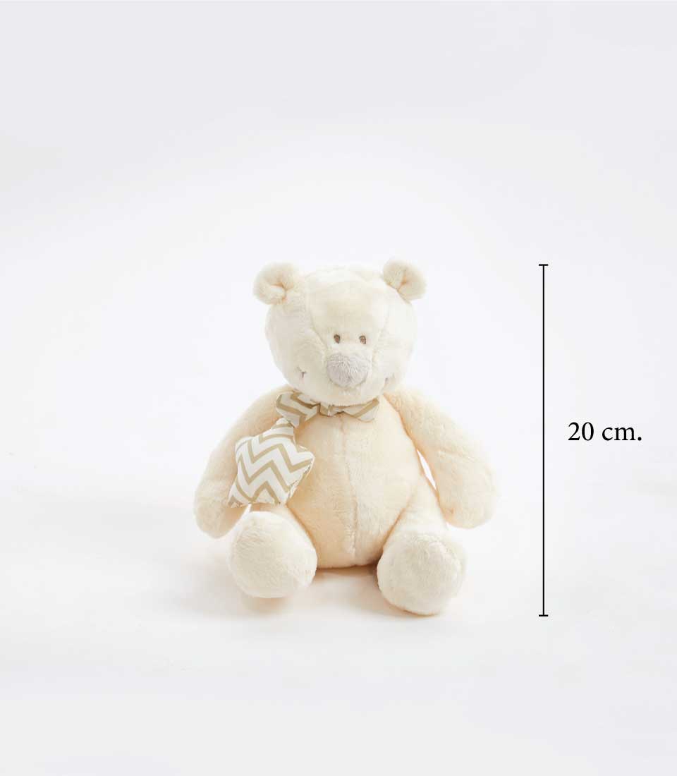 Cream plush teddy bear with chevron patterned bow and star charm, newborn gift