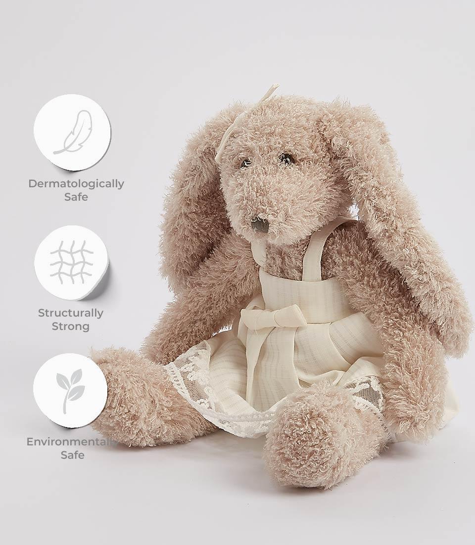 Cream plush bunny soft toy with lace dress and floppy ears, dermatologically safe for babies and kids
