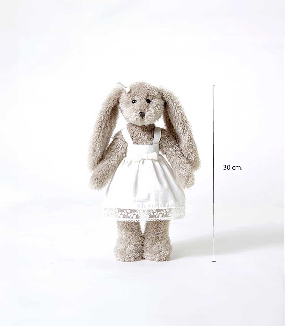 Soft plush bunny in white dress with lace trim, perfect cuddly toy for babies and kids