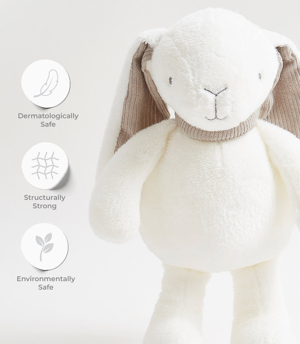 Soft white plush bunny toy with floppy ears, embroidered face, and ribbed collar for babies and kids
