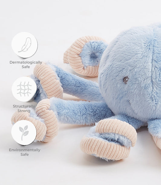 Soft light blue plush octopus toy with cream ribbed tentacles, dermatologically safe and environmentally friendly for babies