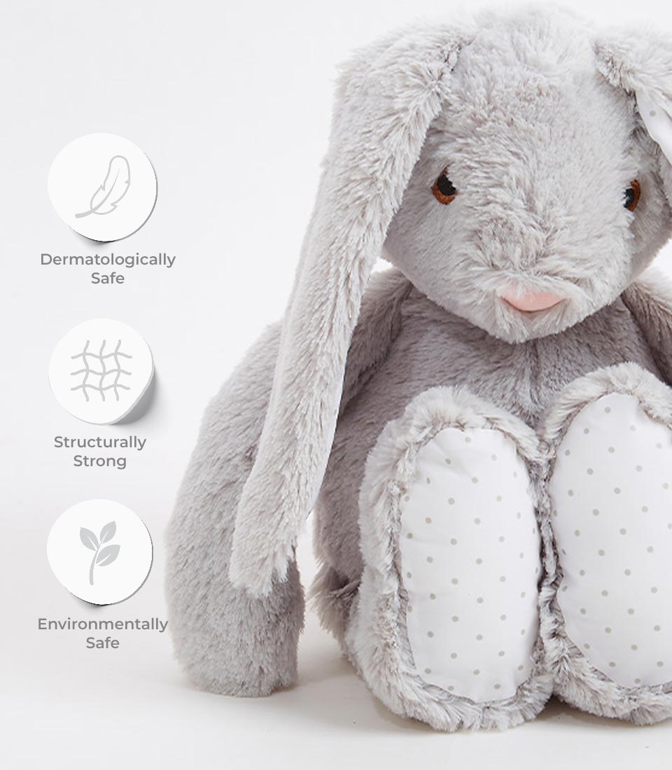 Soft grey bunny plush toy with floppy ears, pink nose, and polka dot feet for babies and kids