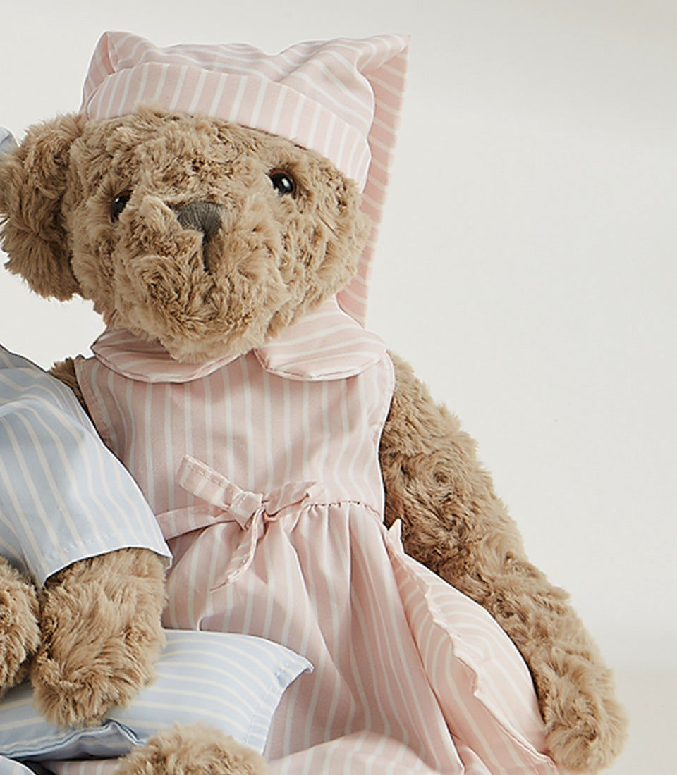 Soft plush teddy bear duo in pink and blue striped sleepwear with matching nightcaps, cuddly bedtime gift for kids
