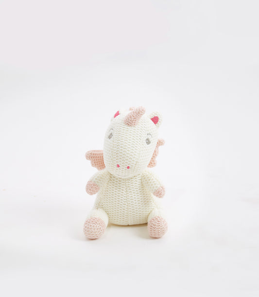 Crocheted white unicorn plush toy with pink horn, wings, and hooves for babies and kids
