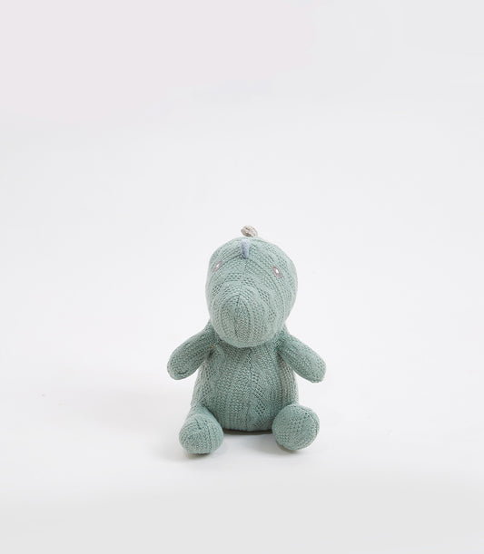 Light green crocheted dinosaur plush toy with textured knit finish and grey ridge detail for babies and kids