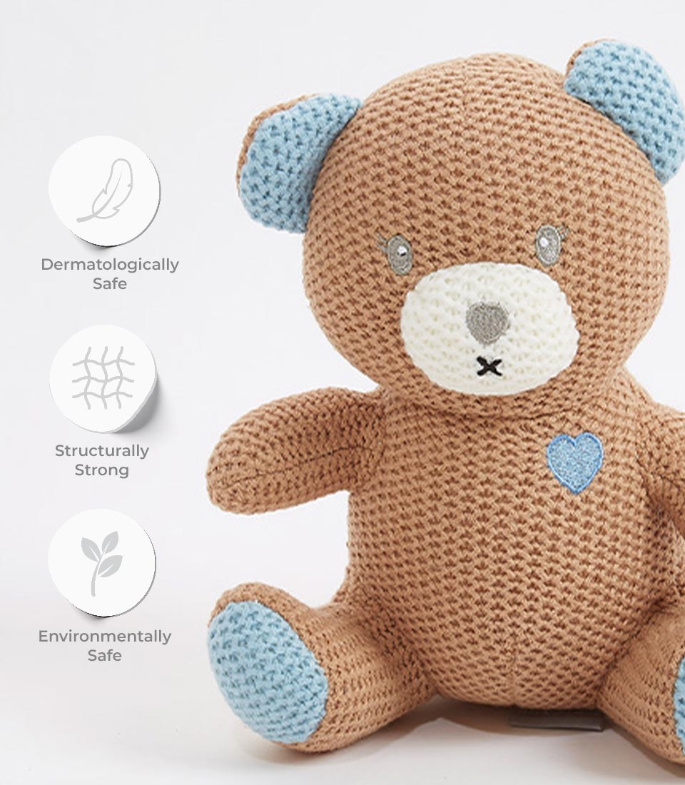 Handcrafted brown and blue crocheted teddy bear with embroidered heart, safe for babies and kids