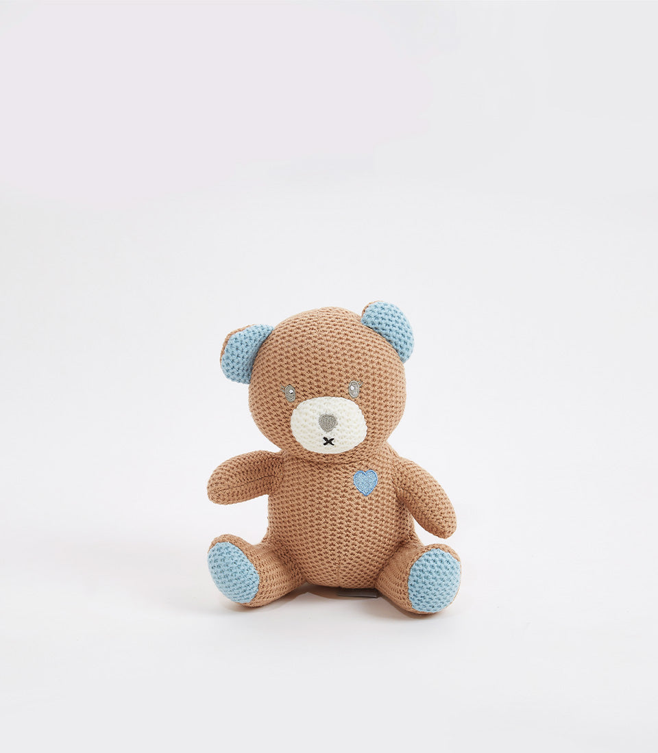 Handcrafted brown and blue crocheted teddy bear with embroidered heart, perfect for baby gifts