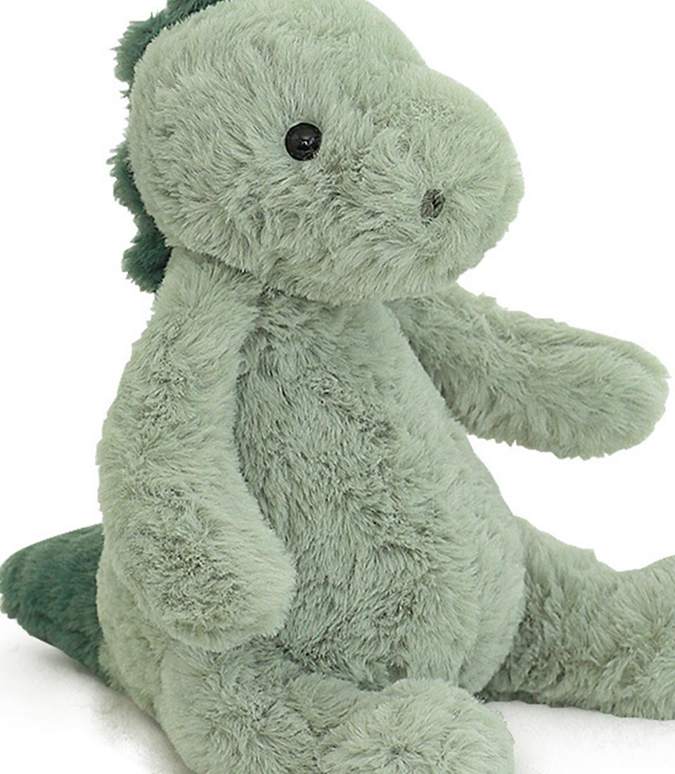 Soft sage green plush dinosaur toy with spiky ridge, perfect for baby and kids gifting