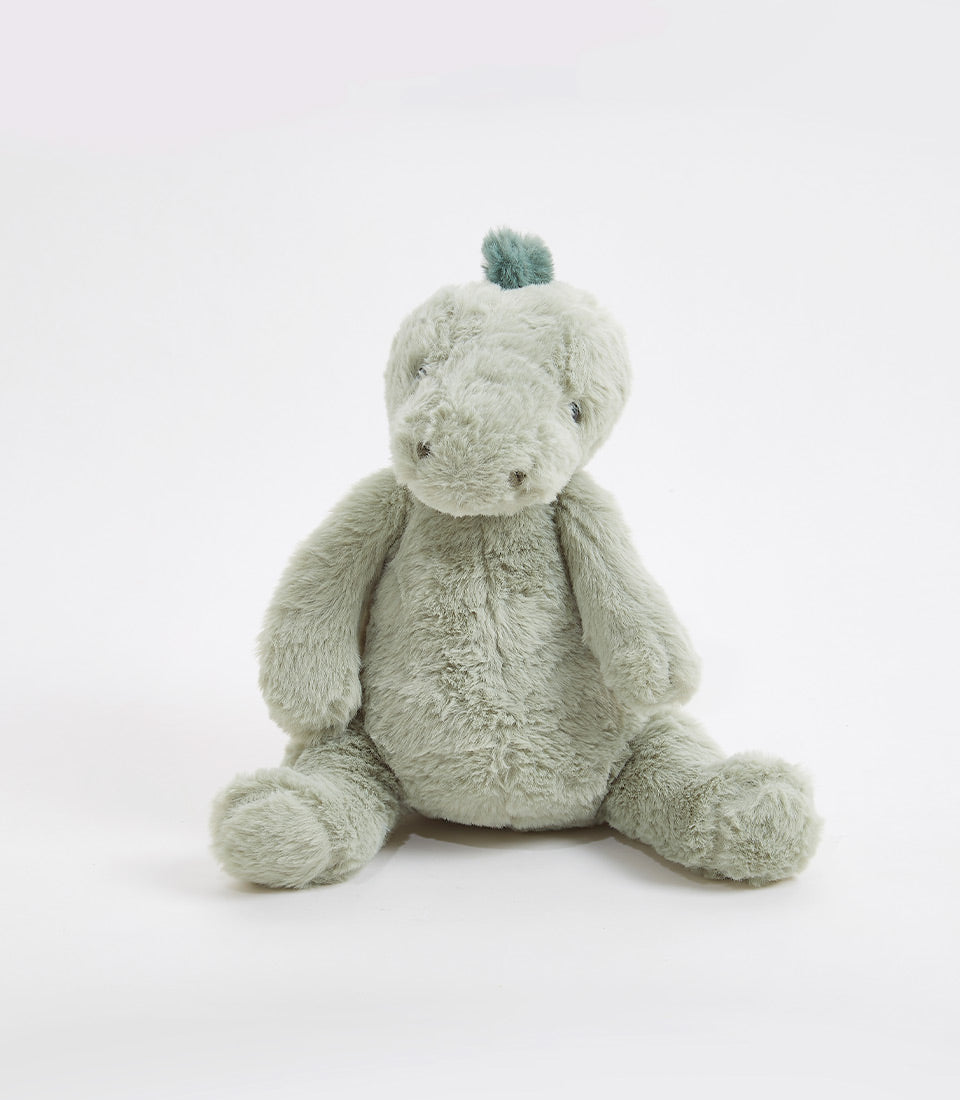 Muted sage green plush dinosaur soft toy with spiky head tuft and gentle embroidered features