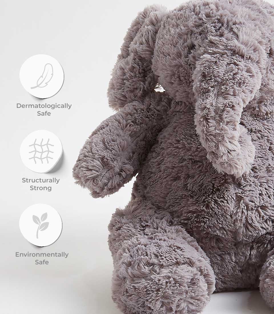 Soft grey plush elephant toy with floppy ears, dermatologically safe and eco-friendly for babies and kids