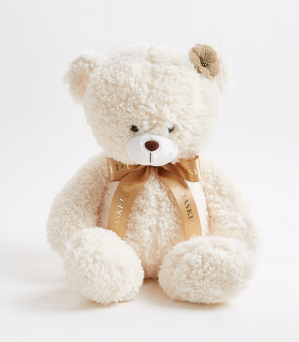 Cream fluffy teddy bear with satin ribbon and fabric flower, ideal luxury gift for kids