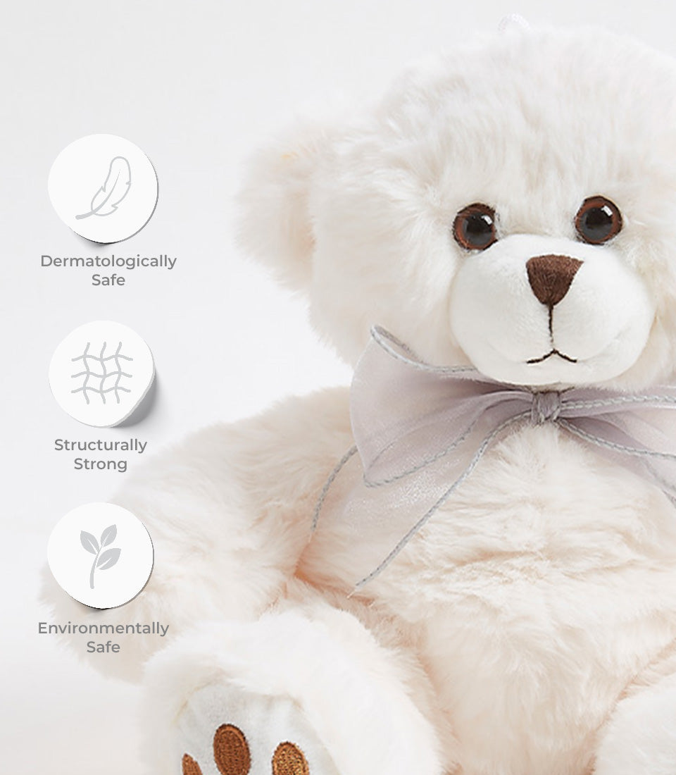 Fluffy white plush teddy bear with grey ribbon bow, dermatologically safe soft toy for kids