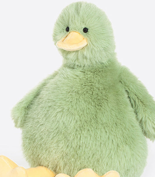 Soft pastel green plush duck toy with yellow beak for babies and kids