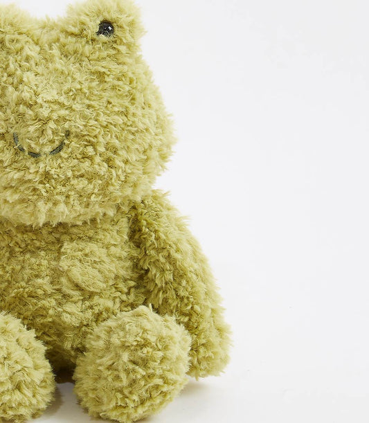 Soft green plush frog toy with shaggy fabric and embroidered smile for babies and kids