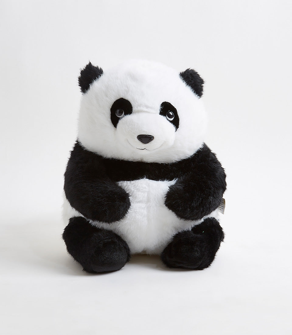 Soft plush panda toy in black and white with stitched smile, ideal for kids' gifts