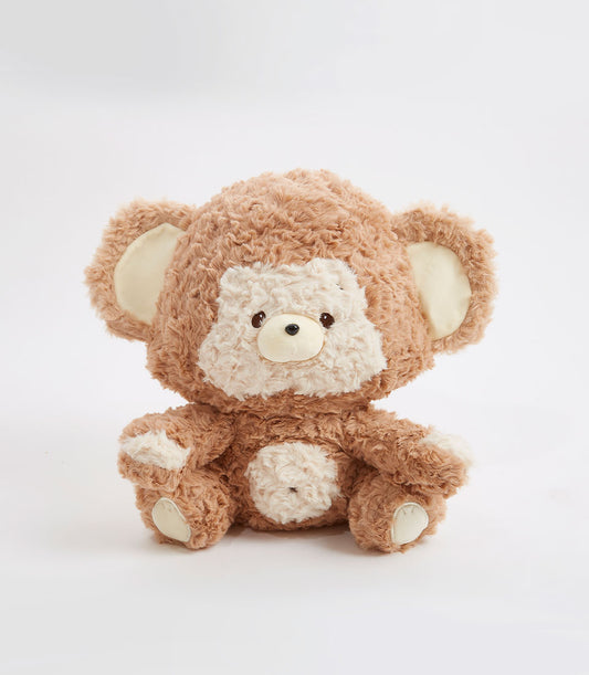 Soft brown plush monkey toy with cream accents and shaggy fur for kids