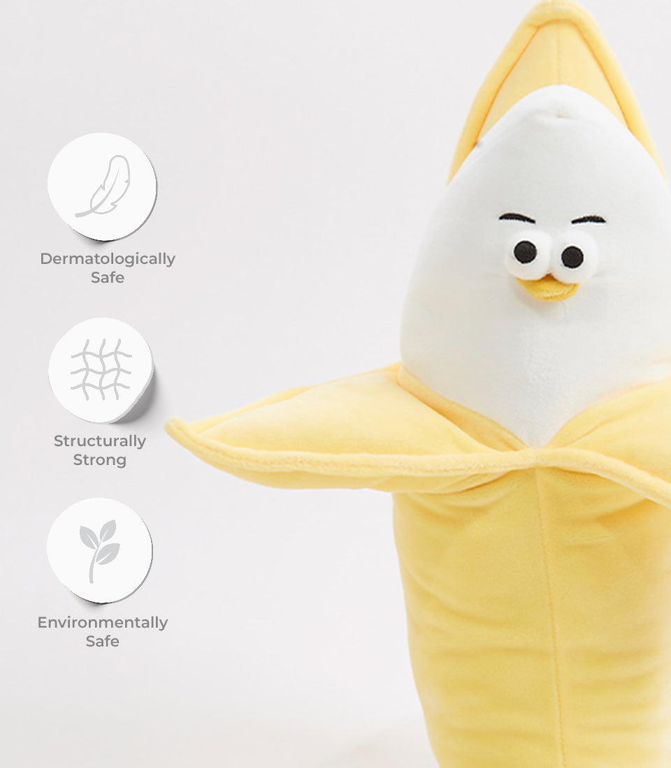 Soft yellow banana plush toy with white face and cheerful smile, dermatologically safe for babies and kids