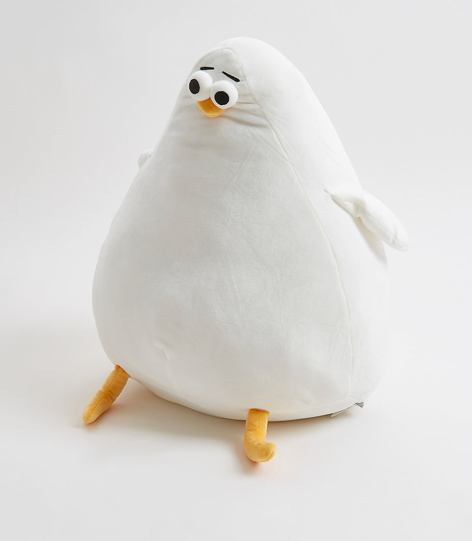 Plush white Oddy soft toy with yellow beak and legs, perfect for children