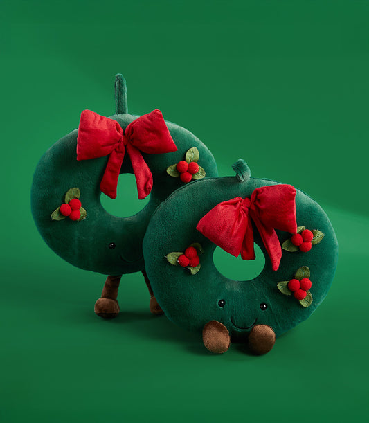 Soft plush green Christmas wreath toys with red bows and berry details by Basketeer