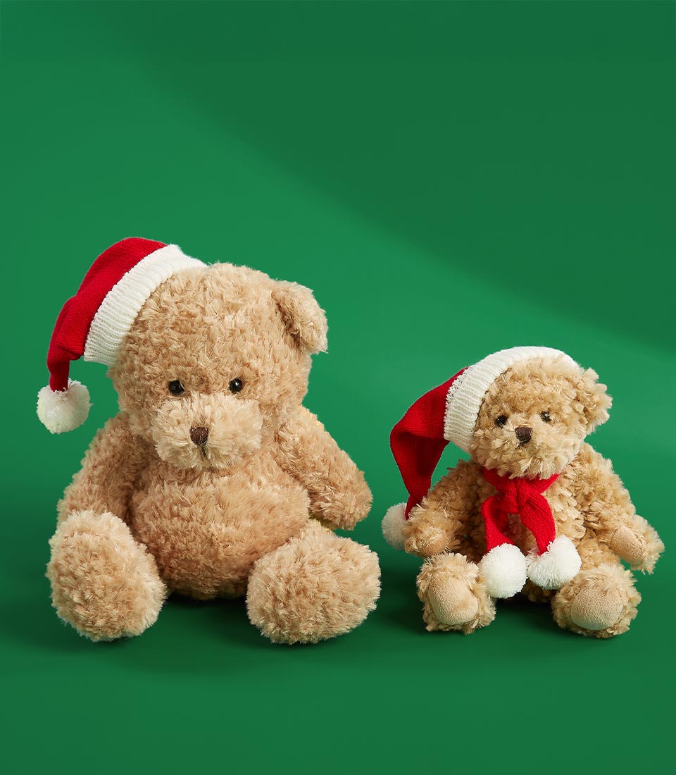 Plush teddy bear pair in Santa hats with red scarf, festive Christmas gift set