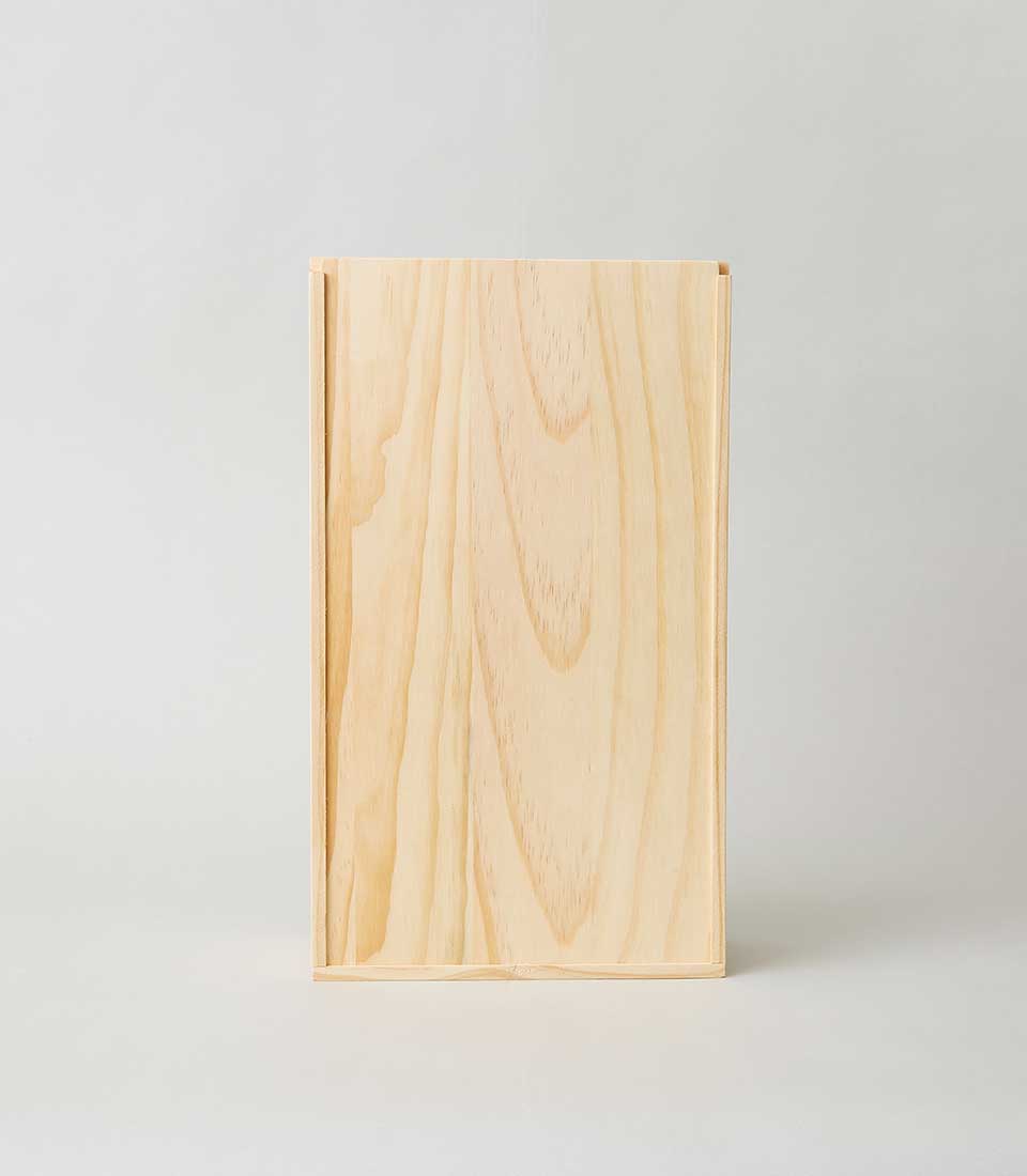 Light pine wooden gift box with sliding compartment lid and natural grain detail