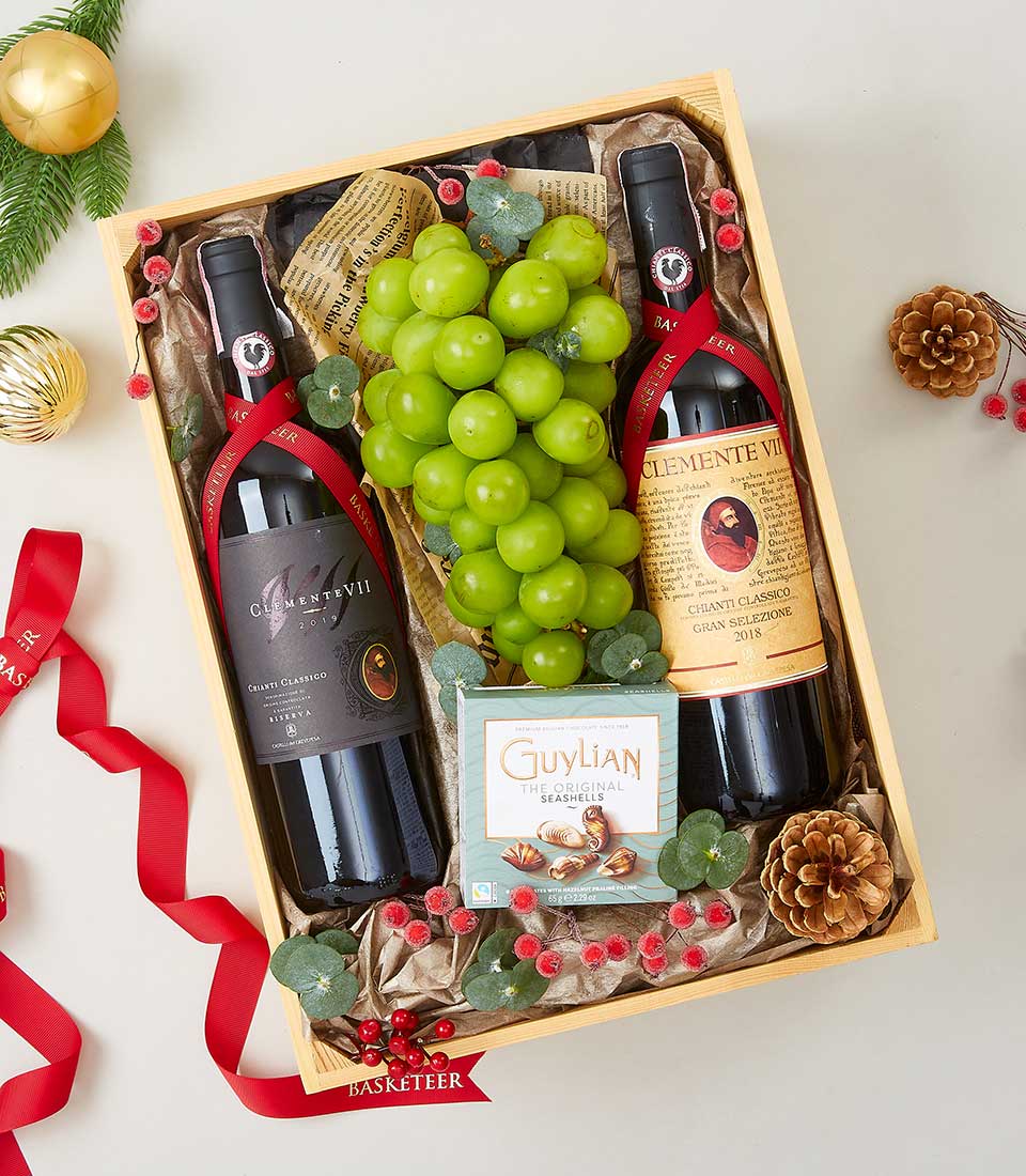 Premium red wine and chocolate gift box with fresh grapes, Clemente VII Chianti, Guylian chocolates in festive wooden crate