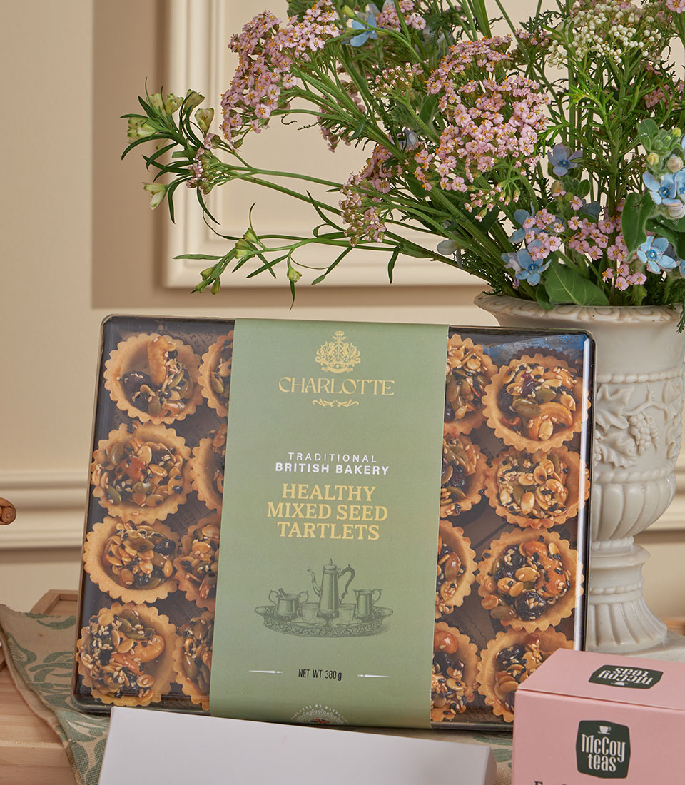 Grand Luxury High Tea Gift Basket with Charlotte's seed tartlets, fresh flowers, and premium tea selection for New Year