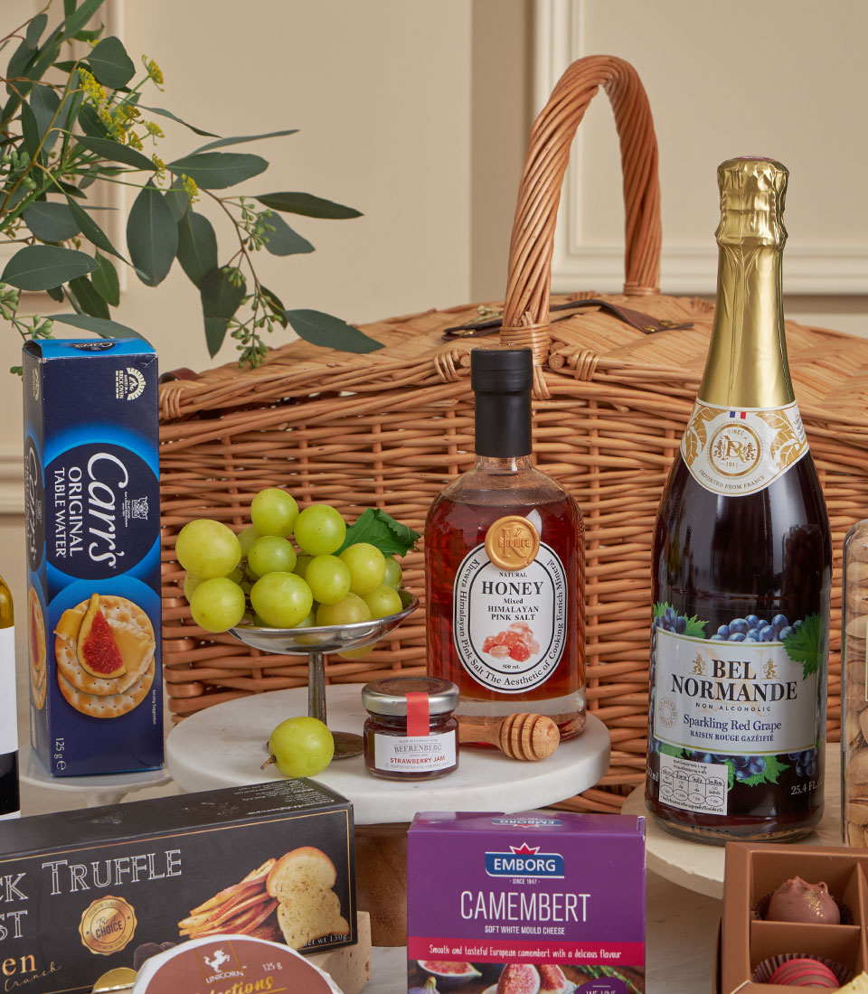 Prestige luxury gourmet gift basket with Carr's crackers, truffle, camembert, honey, and fresh grapes