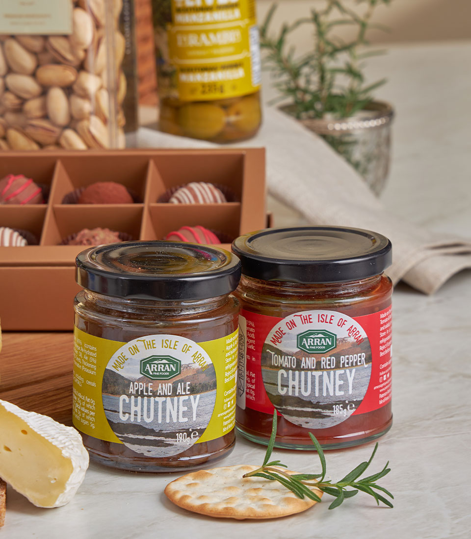 Prestige luxury gourmet gift set with artisan chutneys, Brie cheese, truffles, pistachios, and olives