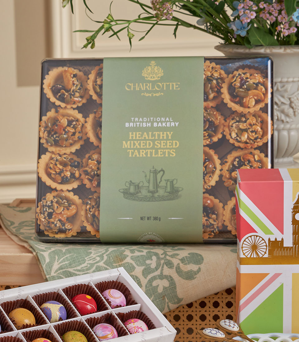 Deluxe Teatime Celebration Gift Set with Charlotte Bakery tartlets, luxury chocolates, and British tea for New Year