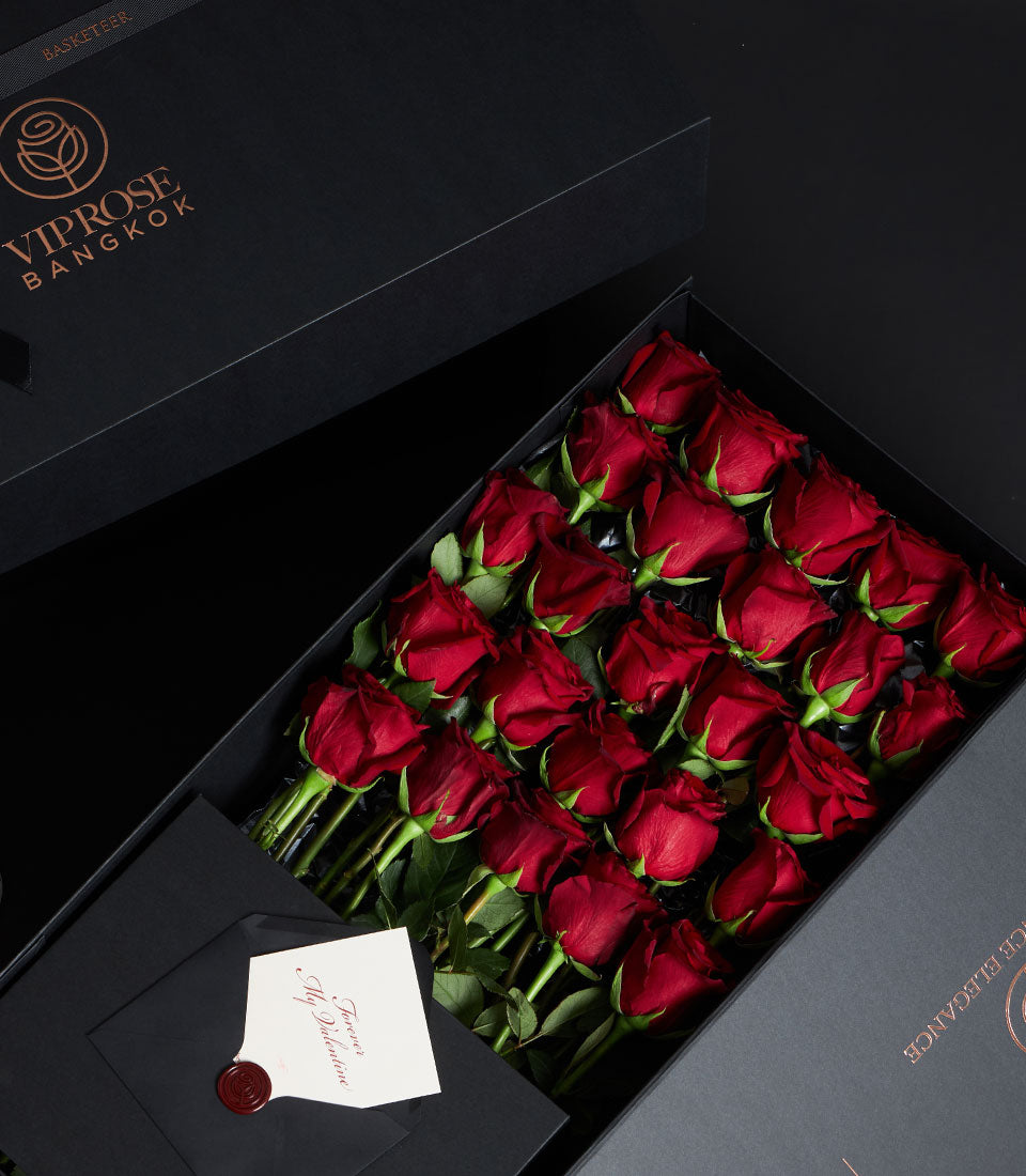 Luxury red rose bouquet in black VIP gift box with Valentine's card and red wax seal