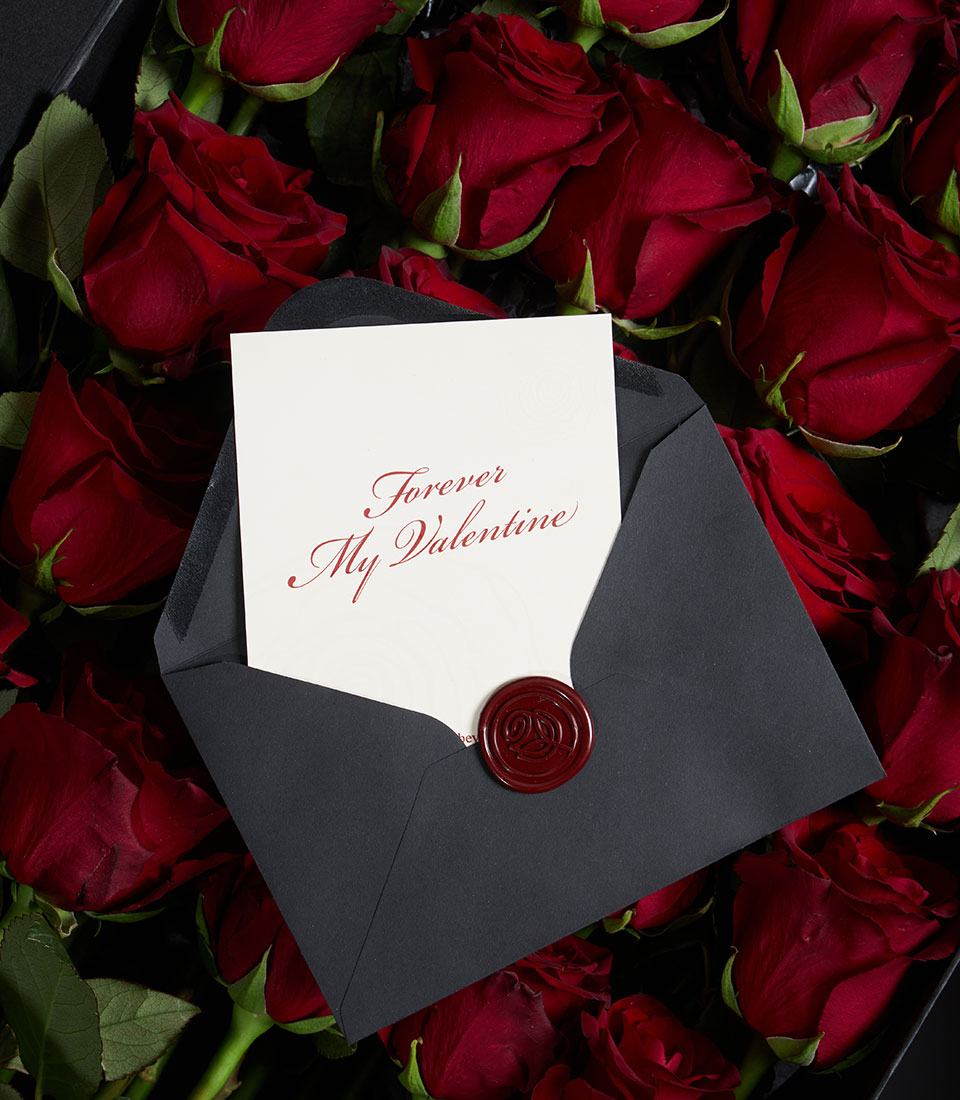 Lush red rose bouquet from Flowers by Basketeer, nestled in a VIP box with a "Forever My Valentine" card. Perfect for flower delivery Bangkok.