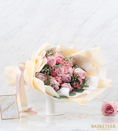 Pink rose bouquet with baby's breath and eucalyptus, cream paper wrap and satin ribbon, fresh Ecuador roses for gifting