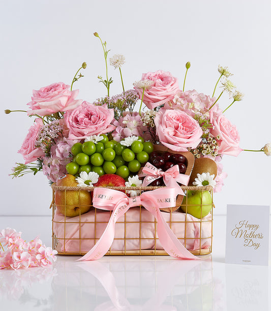 Luxury rose and fresh fruit gift basket with pink hydrangeas, green grapes, cherries, and apples for Mother's Day