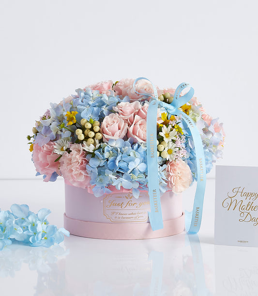 Blue and pink rose and hydrangea arrangement in luxury hatbox, Mother's Day gift