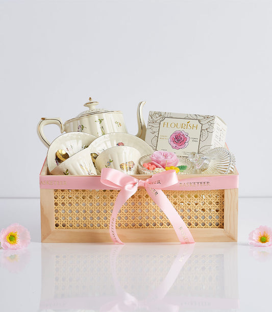 Cream ceramic teapot and teacups with floral designs in wooden crate gift set, perfect for Mother's Day
