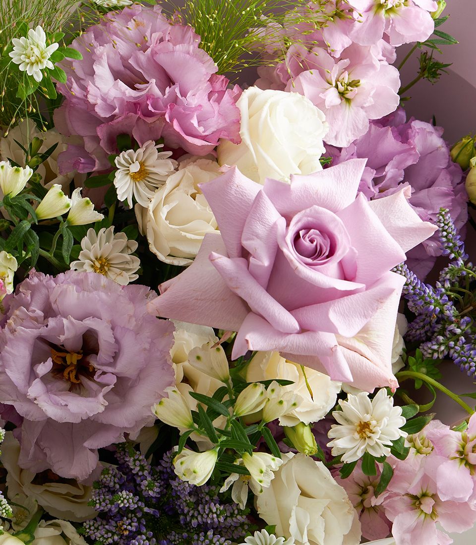 Purple pastel mixed bouquet with roses, lisianthus, and alstroemeria for gifting