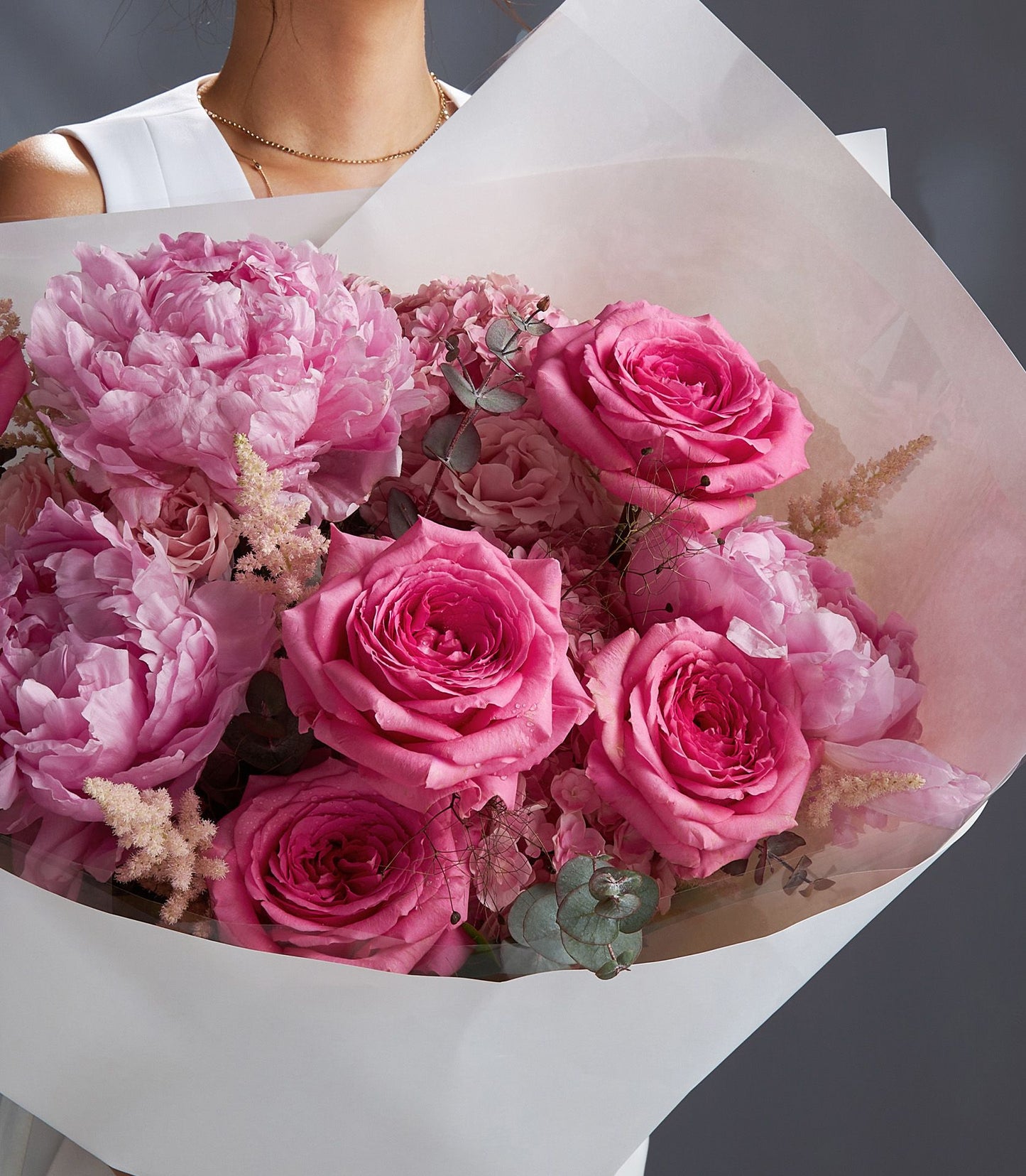 Premium pink peony and rose bouquet with hydrangeas, wrapped in soft paper for luxury gifting