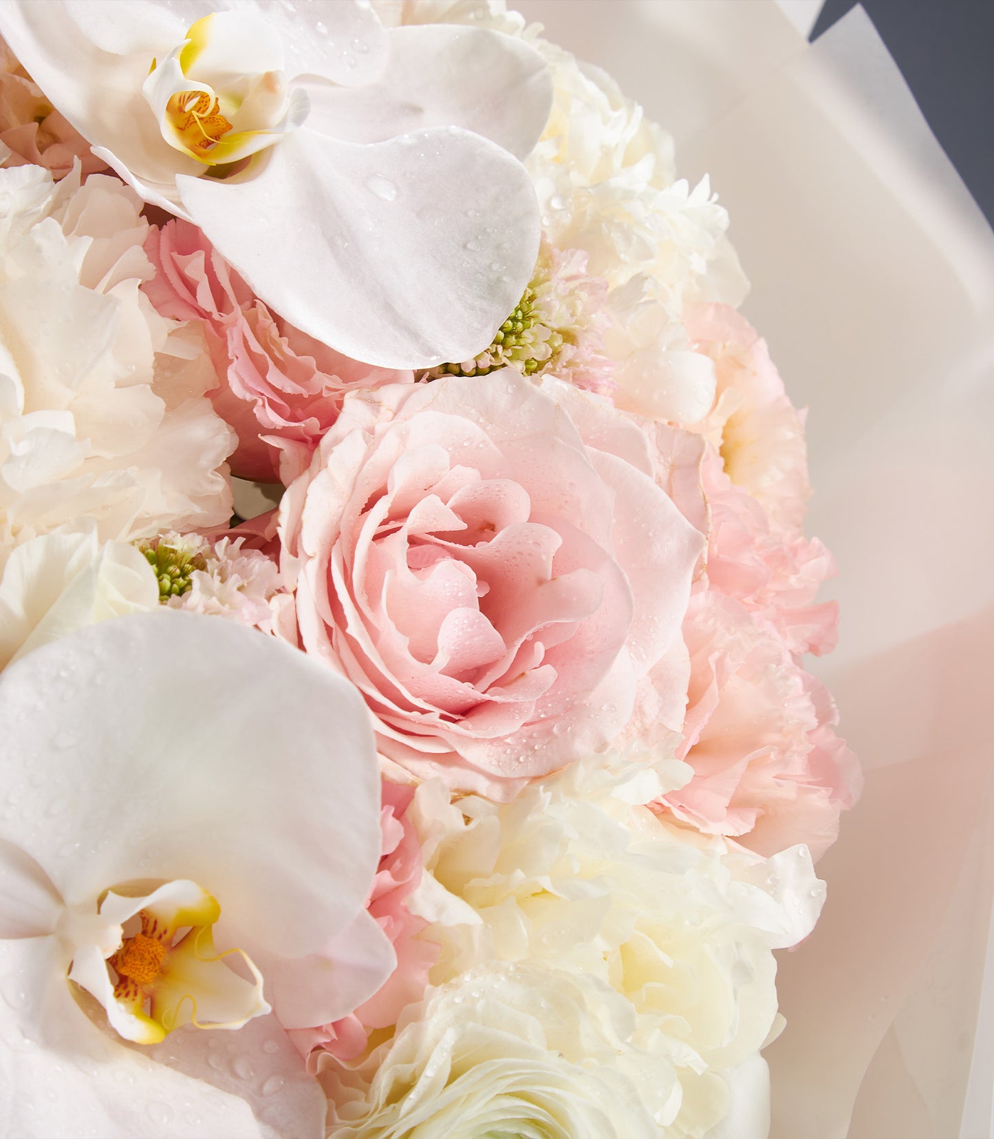 Premium mixed peony bouquet with white orchids and light pink roses, fresh cut luxury flowers