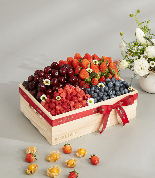 Premium mixed berry wooden crate with cherries, strawberries, raspberries, and blueberries for birthday gifting