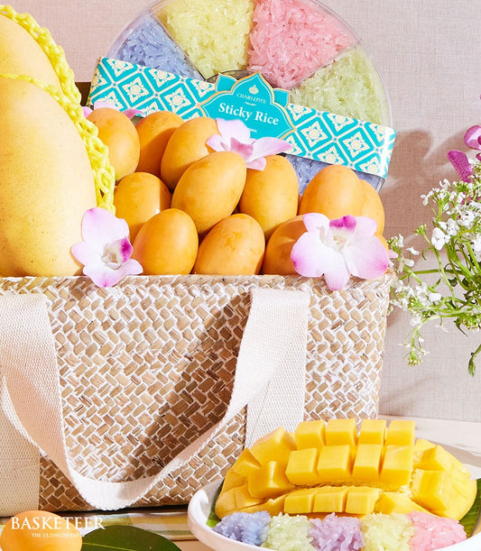 Vibrant mango and sticky rice gift basket with tropical orchids and colorful rice selection