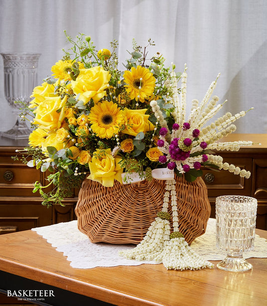 Vibrant yellow roses and gerbera daisies in woven basket for Songkran Thai New Year celebration