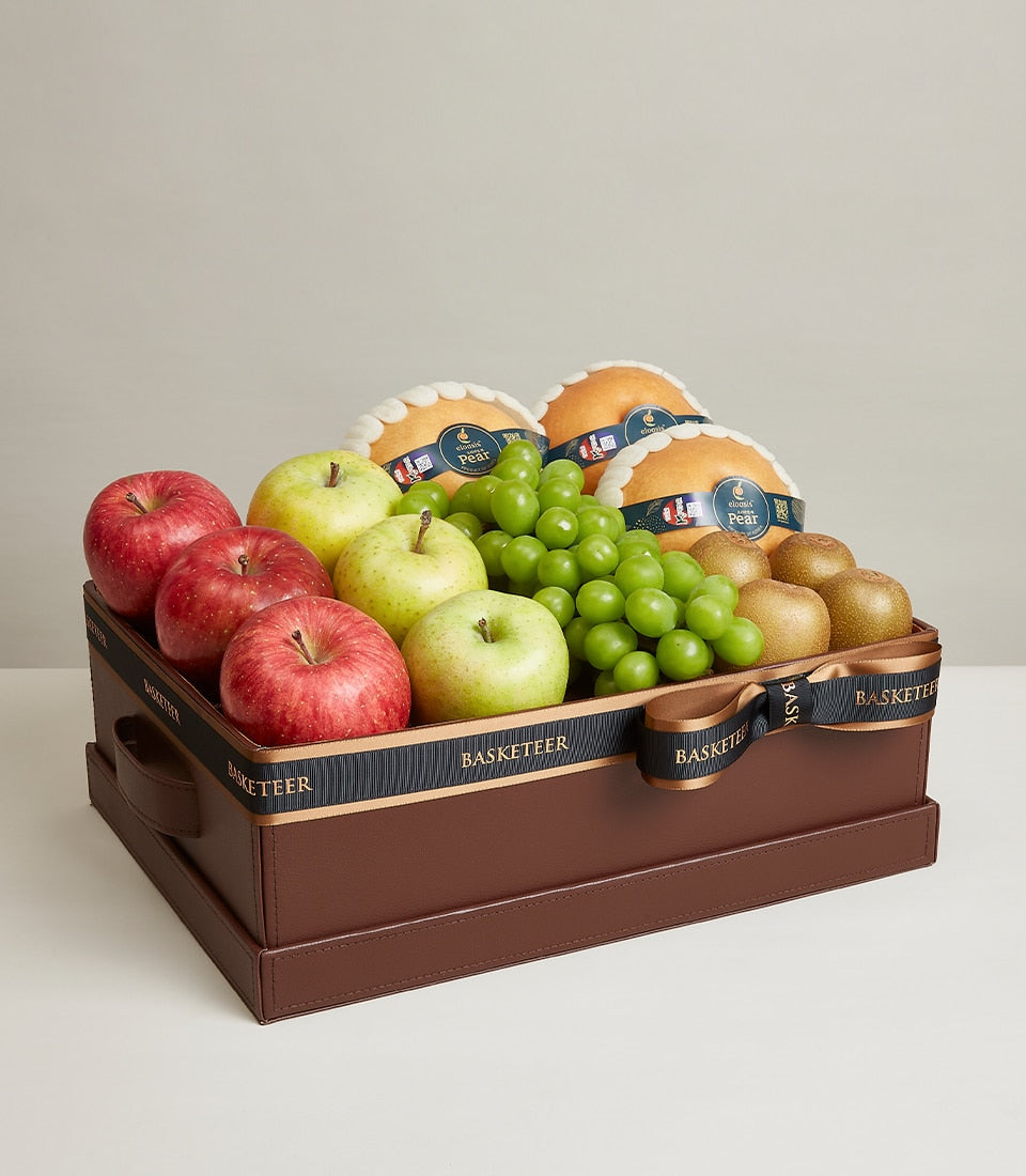 Basketeer luxury gift basket Bangkok: Crisp apples, juicy grapes, Asian pears and kiwi in a handsome brown gift box with ribbon.