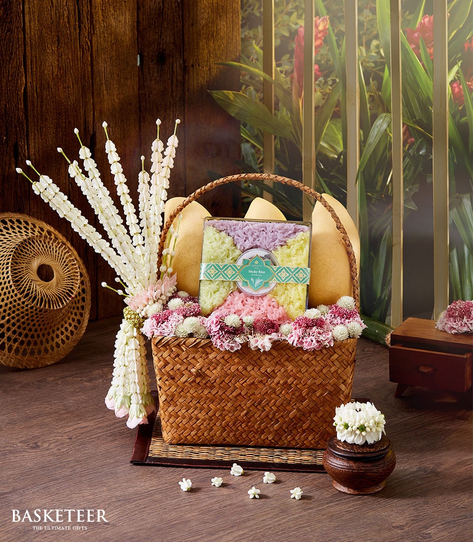Premium mango and sticky rice gift basket with Thai flowers, ideal for Songkran and New Year celebrations