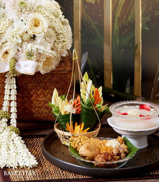 Premium white roses and dahlias with khao chae, fried snacks, and carved vegetables for Thai New Year Songkran