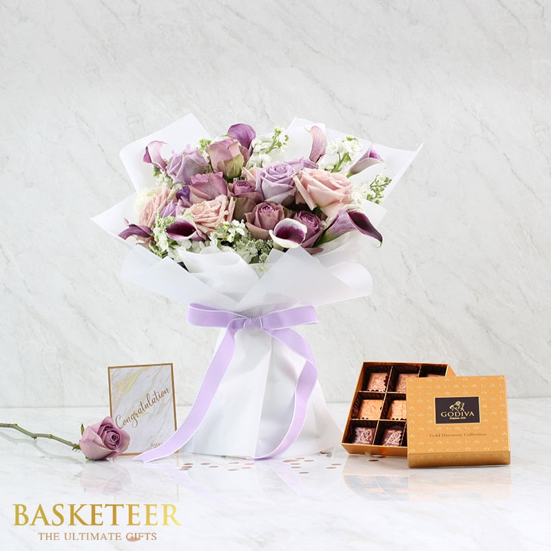 Purple rose and calla lily bouquet with luxury chocolate gift set in gold box, tied with lavender ribbon